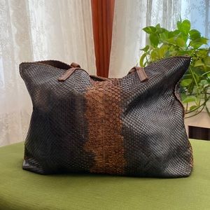 B. May medium sized shoulder bag, excellent condition